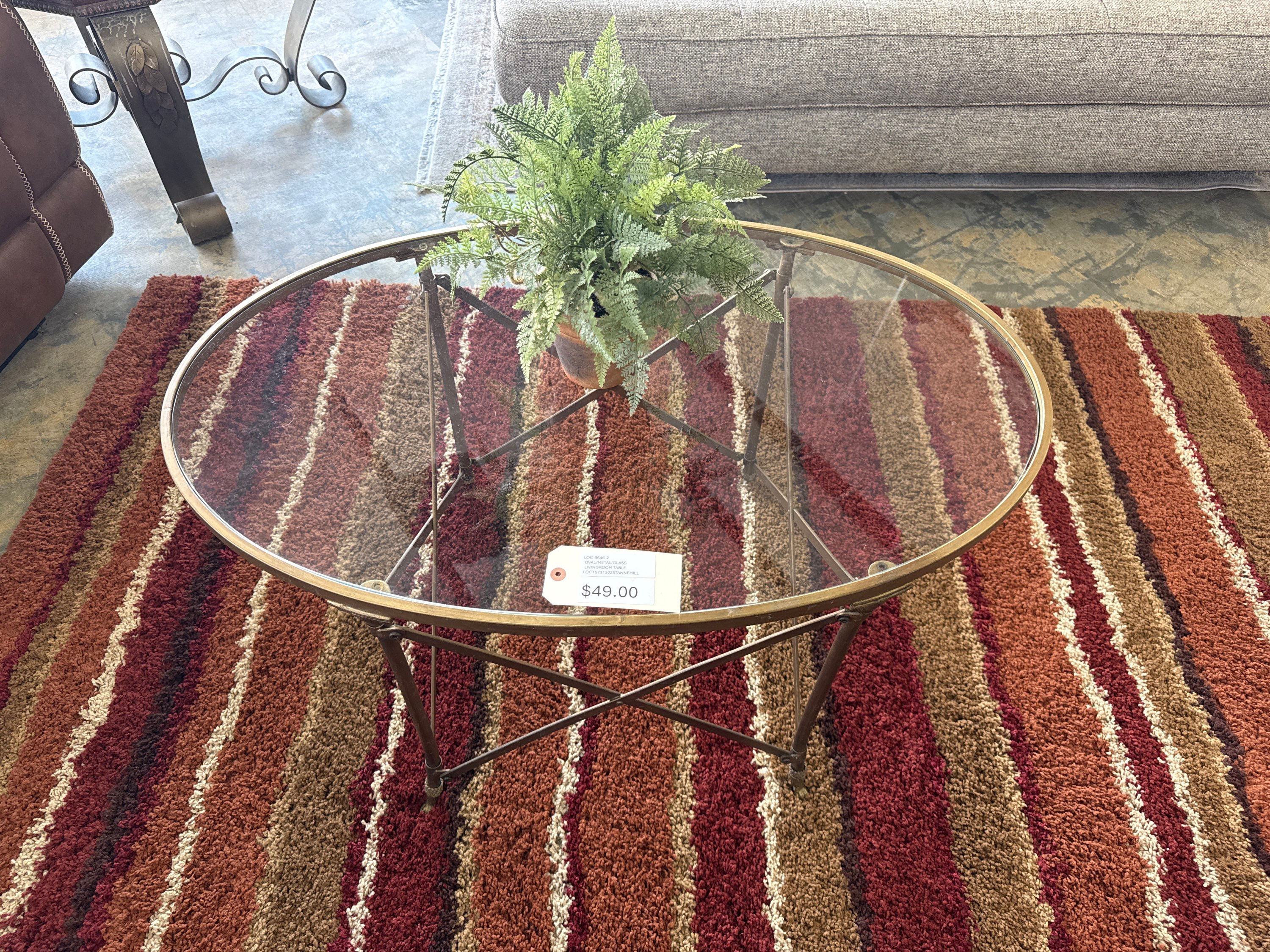 OVALCOFFEE TABLE WITH SMOKED GLASS BY BALLARD DESIGNS