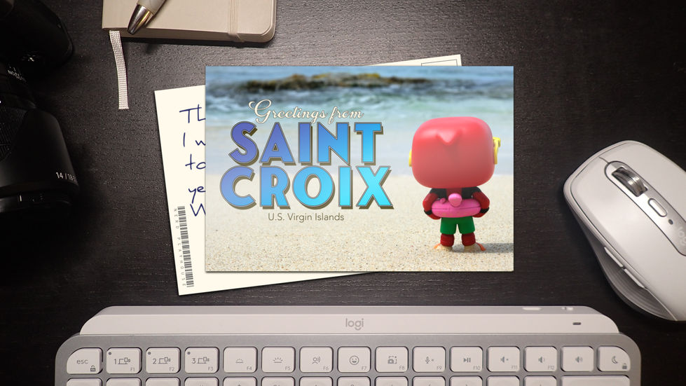 Creative toy photography of Funko POP Lazy River Deadpool appearing on a post card on my desk.