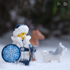 Creative photography of LEGO Snow Warrior, wolf and reindeer in the snow
