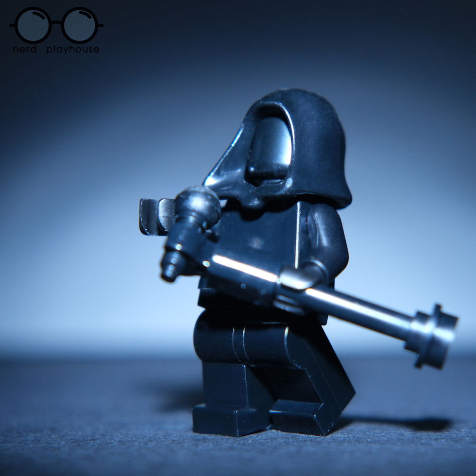 Creative photography of black LEGO figures and accessories