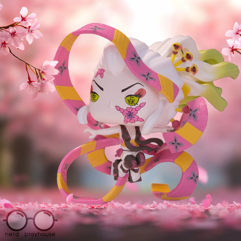 Creative toy photography of Funko POP Daki using her ribbons in a cherry blossom garden.