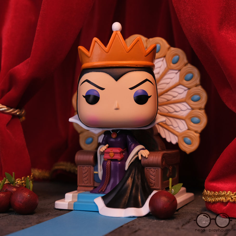 Creative toy photography of Funko POP Evil Queen from Snow White sitting on her throne