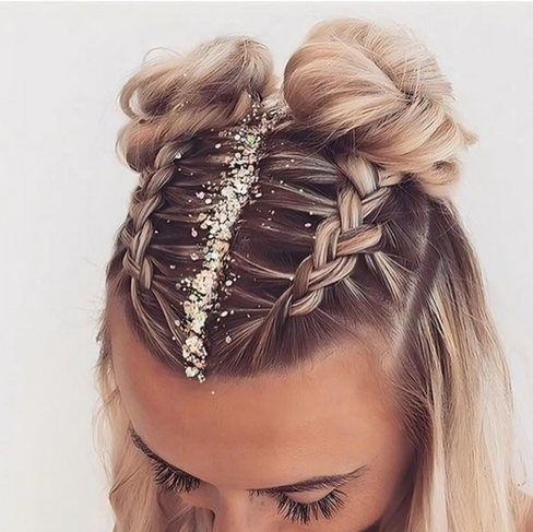 Space buns with glitter on blonde hair