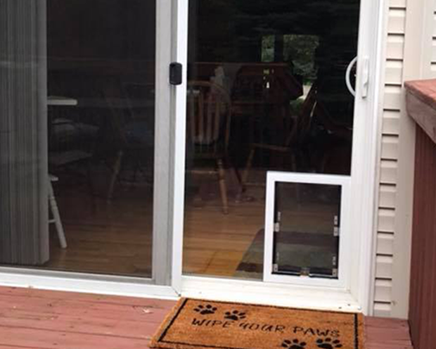 newly installed pet door in sliding glass door