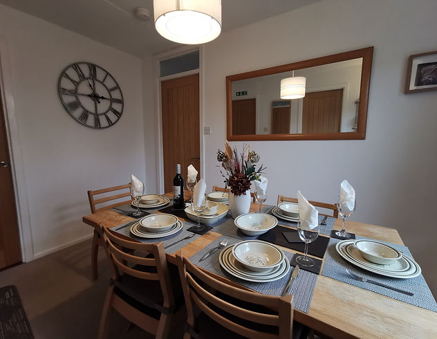 Silvertrees dining room table set out for a meal