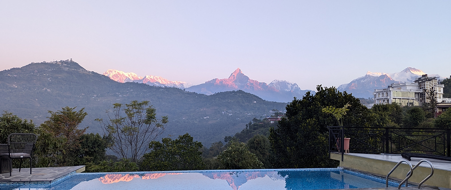 Sunrise from The Pipal Tree Mountain Villa Pokhara.png