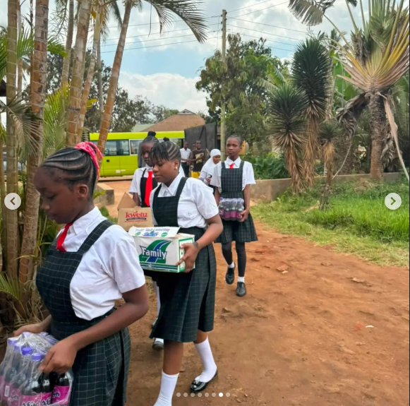 Wide-angle view of students arriving at a children’s care centre in Morogoro