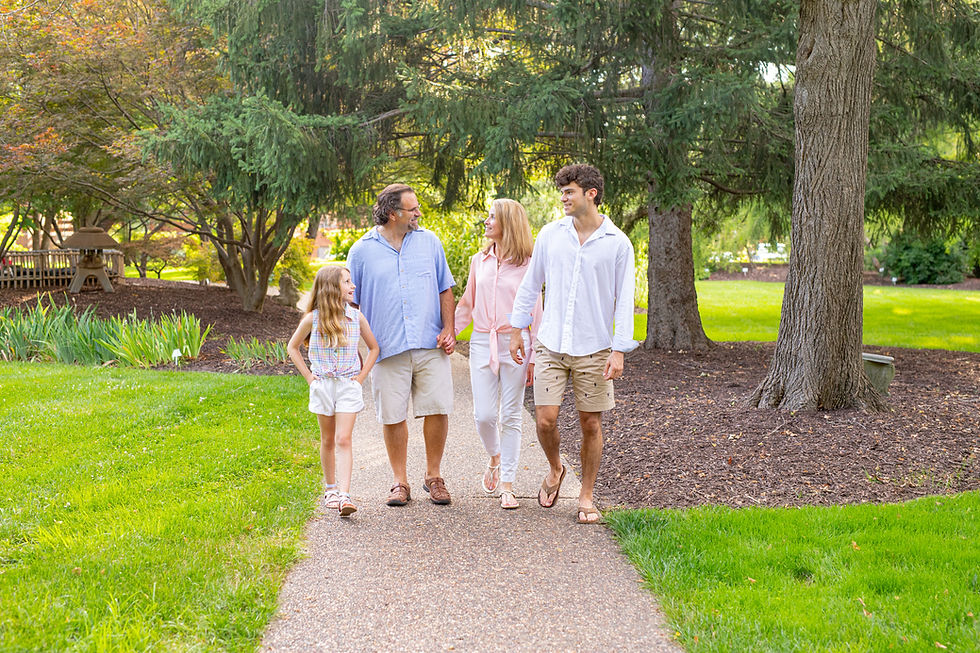 Family walking and chatting during photo session in Columbia, MO | KatFour Photo