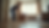 Eye-level view of a delivery professional carefully unpacking a large sofa inside a living room