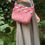 Thumbnail: 'Ruddington' - Pinky-Red Textured Shoulder Bag with Pom Poms details