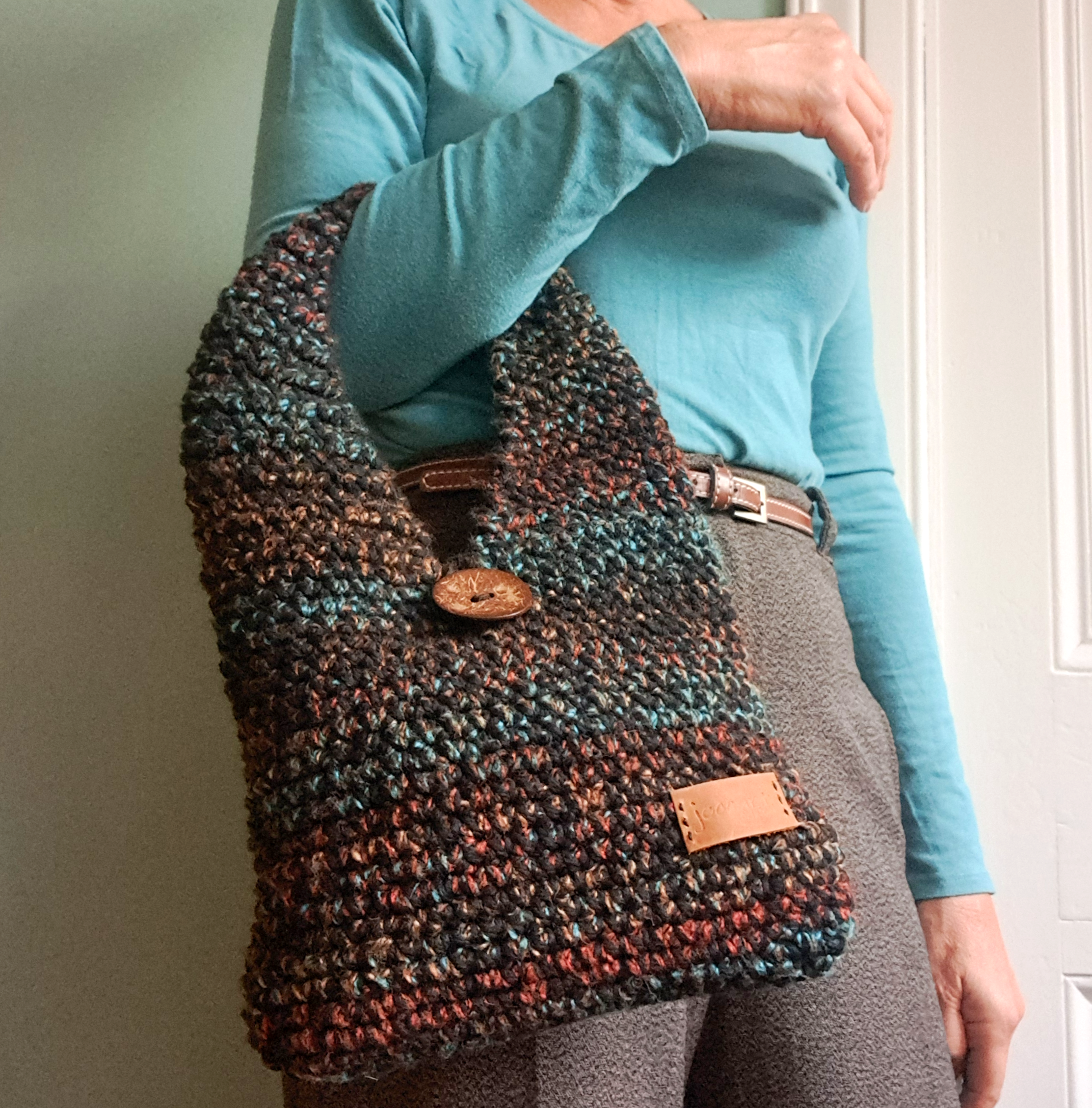 ‘Melrose’ – Textured Curved-Handle Crochet Bag in Black, Rust & Turquoise