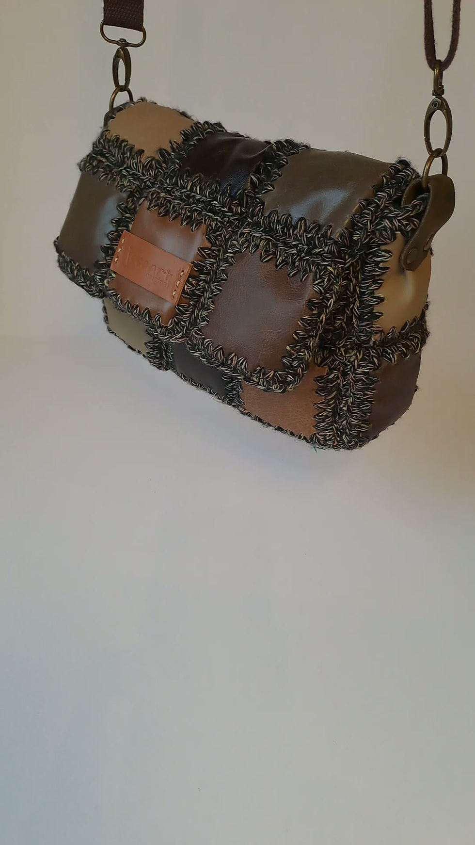 Thumbnail: 'Atlas Rich Browns' - padded leather patchwork cross-body bag lined in wool