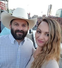 Jon posing with his wife