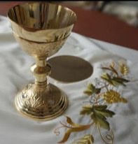 John's ordination chalice, paten and alb