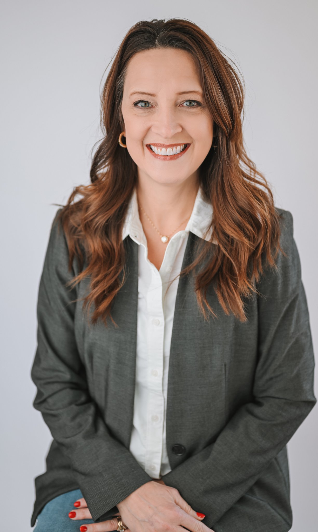 Keri Headshot--January2026.jpg