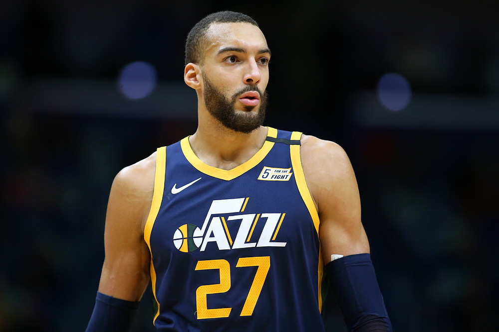 Utah Jazz center Rudy Gobert looks into the distance during an NBA basketball game.