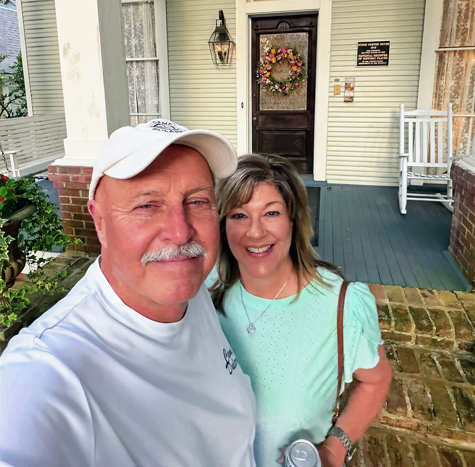 Guests Mary and Mr. Martin on the front porch of Judge Porter House Bed and Breakfast in Natchitoches, Louisiana.