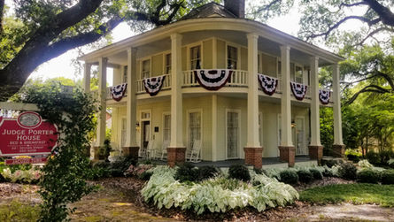 Exterior view of the Judge Porter House, a grand 1912 Edwardian luxury historic inn in Natchitoches, LA.
