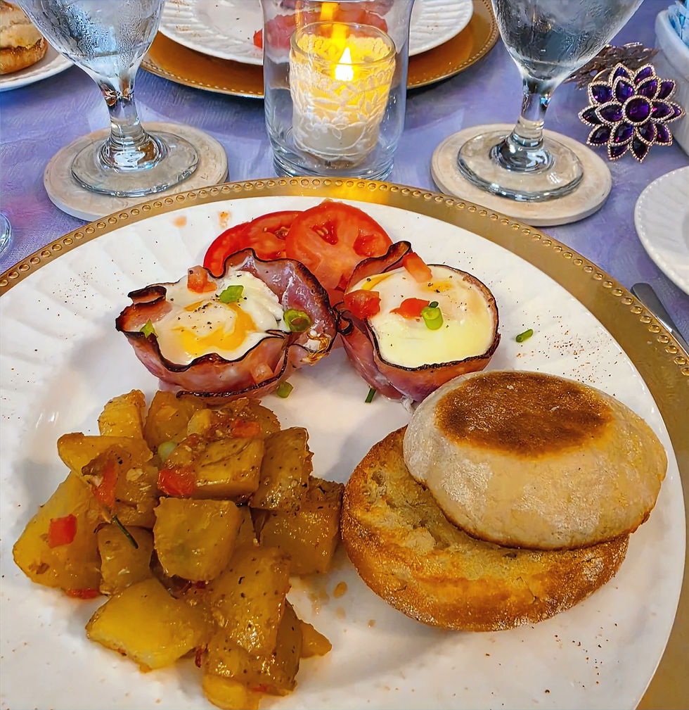 A beautifully plated second-course gourmet breakfast of savory ham and egg crisps paired with seasoned rosemary potatoes served hot at our premier Louisiana boutique inns collection.