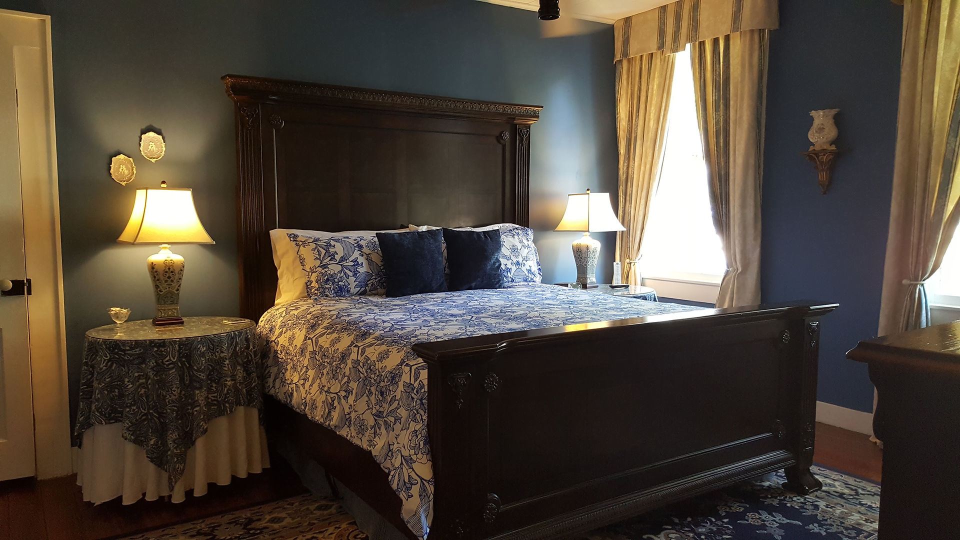 Ducournau Suite with King sized bed, ensuite bath and separate sitting area.