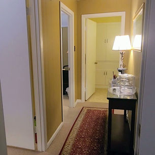 The primary bedroom of the family-friendly Tucker Suite at a luxury Louisiana bed and breakfast.