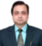 Portrait of Dr. M.K. Singh in a formal suit and tie