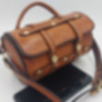 Hand crafted leather handbag in tan