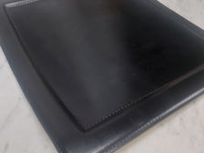 Korium seat leather replaced and hand stitched.