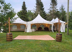 lights going from the tent to wine barrel