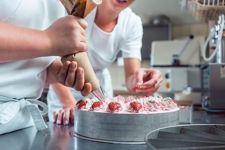 Confectioner-or-pastry-chefs-finishing-c