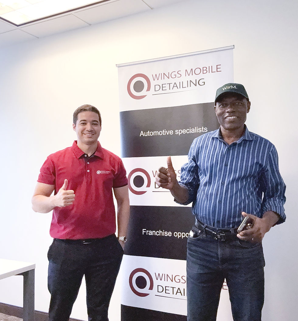 Immigrant Franchise Owner giving a thumbs-up