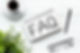 FAQ concept. Text on office table. Information Helpdesk.jpg
