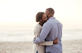 Young African woman hugging her partner