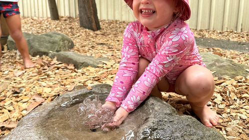 Having fun with outdoor activities at Kidzspot Early Learning Centres in Erskine Park.