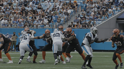 CG animation showing NFL quarterbacks throwing passes during Digital Athlete motion testing.