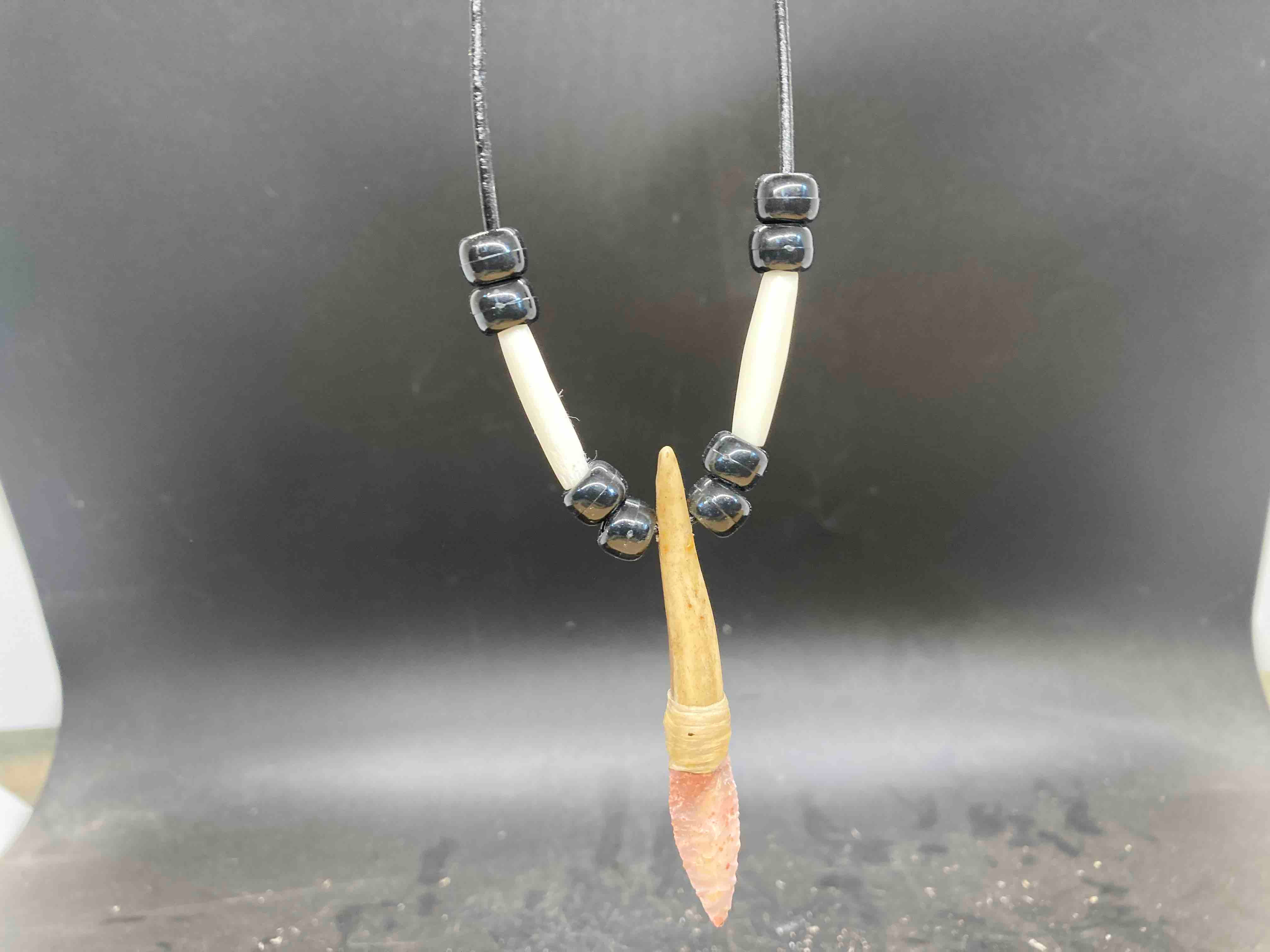 J-03... Nethers Farm Flint Ridge flint, 24" black leather cord with clasp.