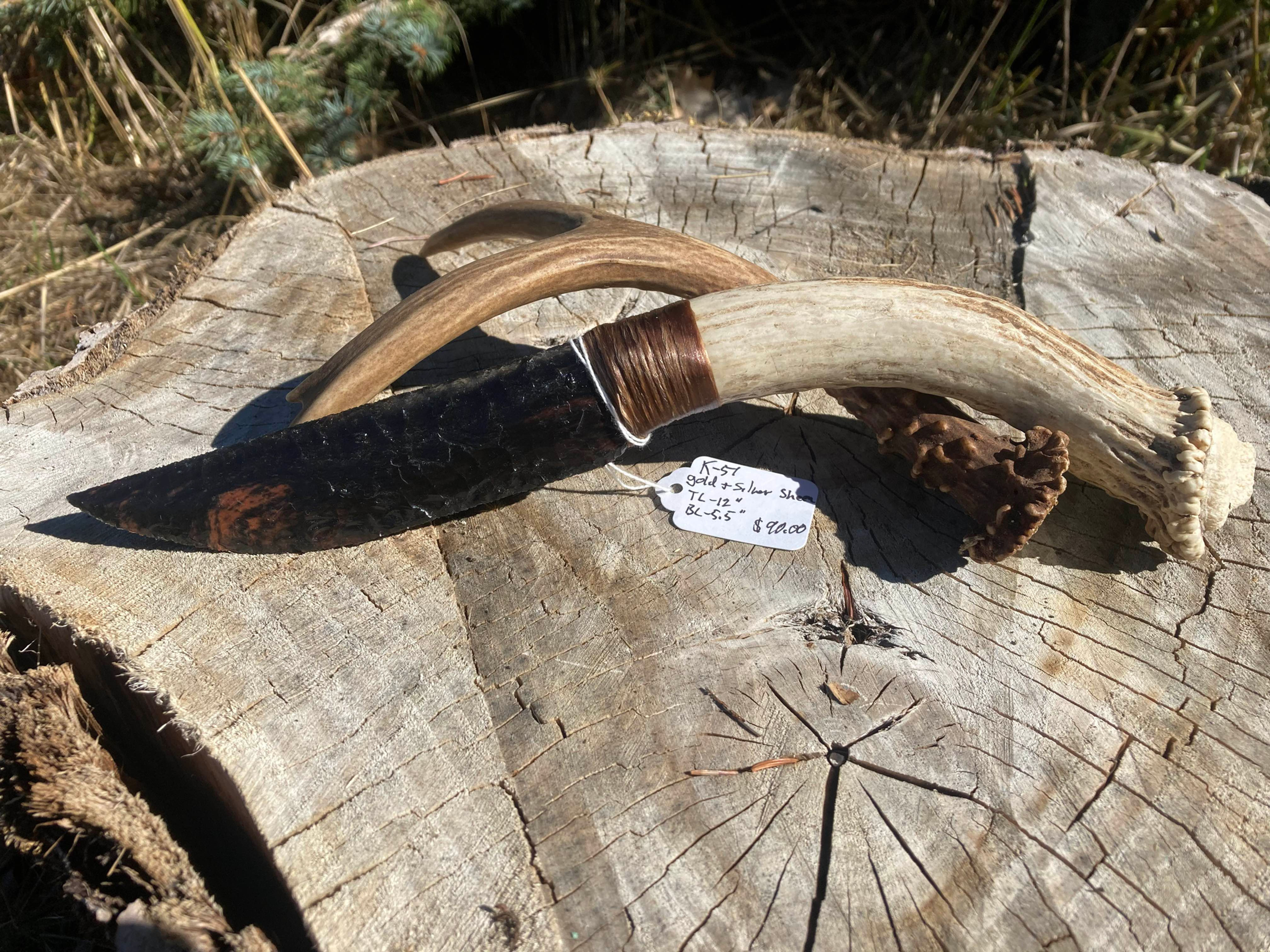 K-51...  Gold/Silver sheen obsidian blade.  Knife is 12 inches in length