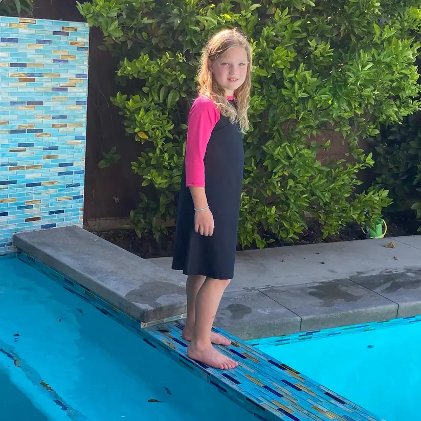 Thumbnail: Girls UV Protectant Swim Dress in Black n Deep Pink