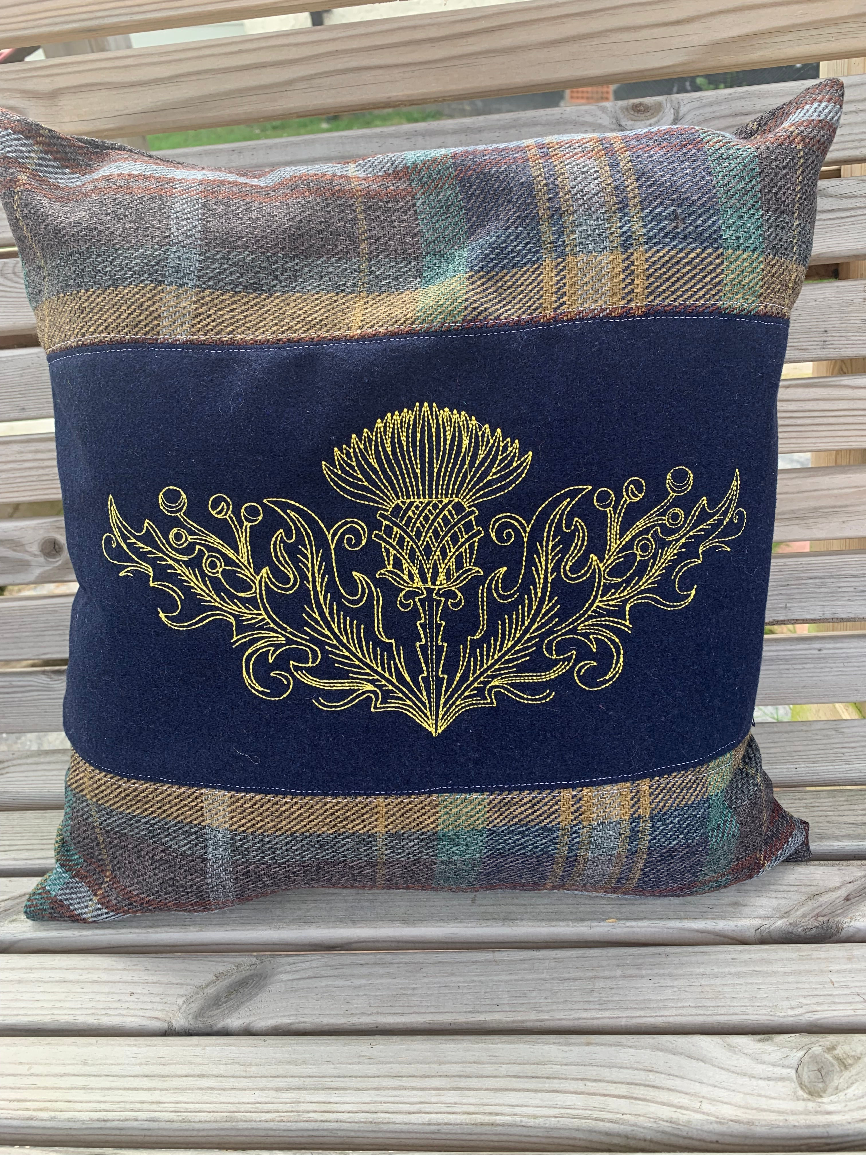 Thistle embroidered cushion