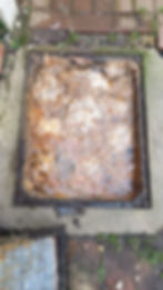 Blocked drain with sewage buildup before drain unblocking service in Stourbridge