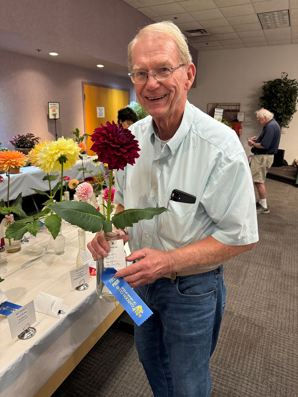 Arnie holding A.C. Cowlitz and Blue Ribbon. Photo: Diana Pierce
