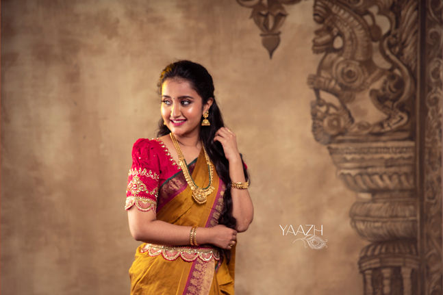 Red Puff Sleeve Embroided Blouse with Embroieded Belt by YAAZH Designer wear