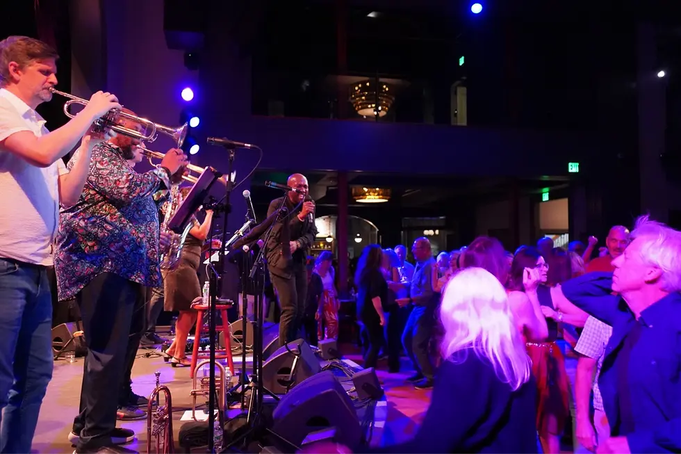 Crushville band playing to a dancing audience