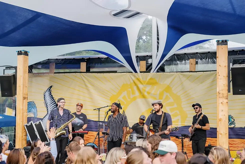Crushville band playing at an outdoor festival