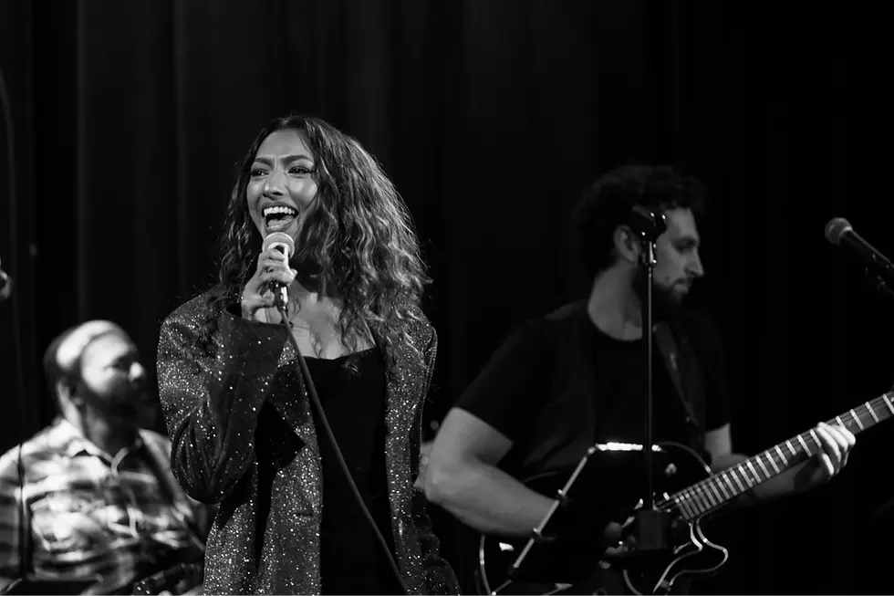 Crushville member singing at a show