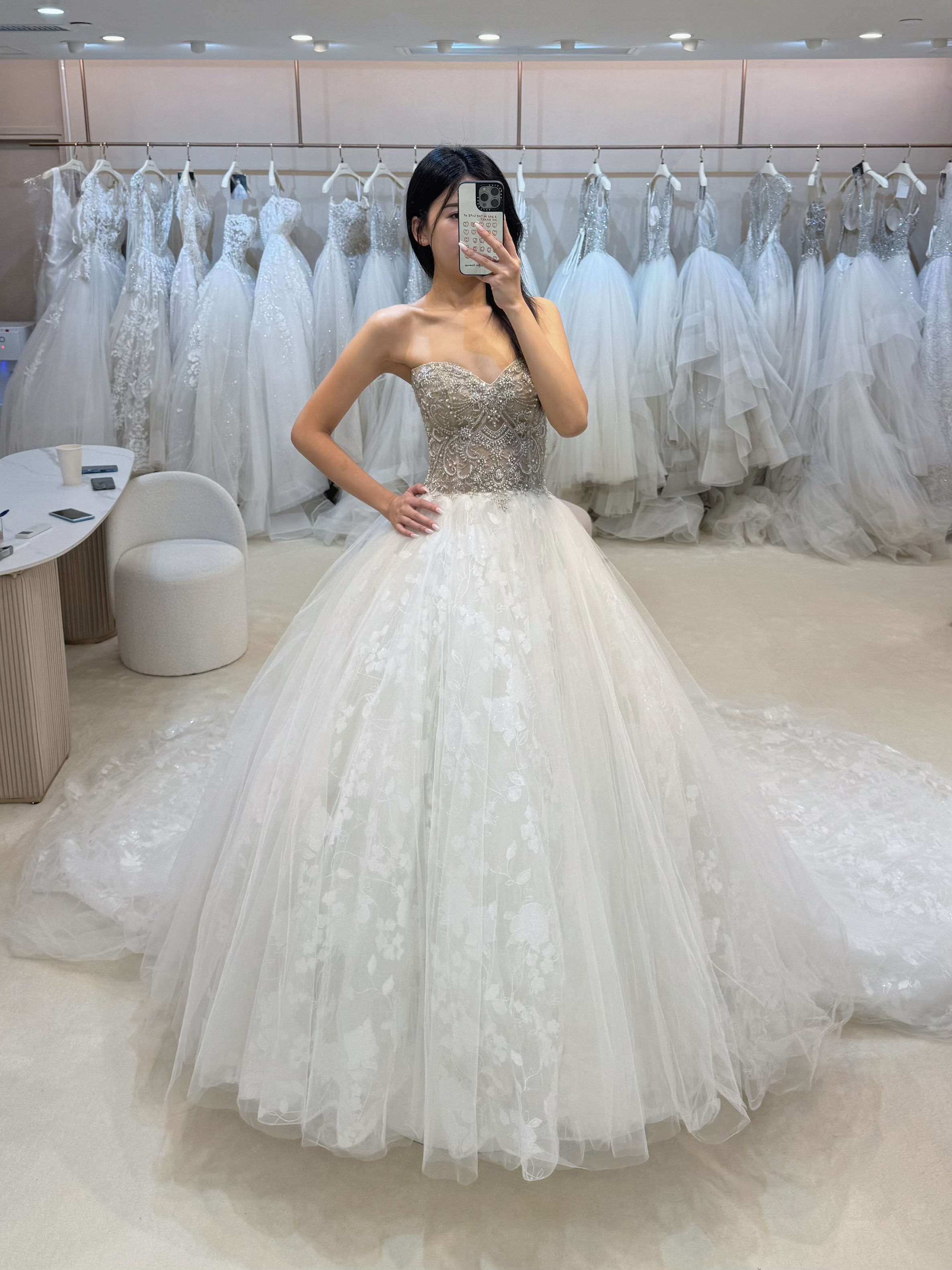 Strapless ball gown with crystal-beaded sweetheart bodice and voluminous white tulle skirt