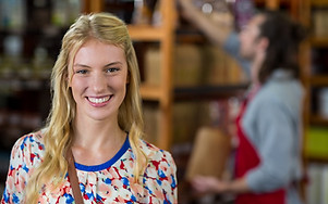 portrait-of-smiling-woman-in-supermarket-2026-01-11-10-30-54-utc.jpg