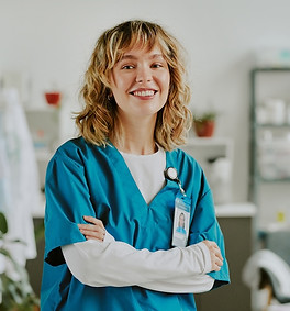 smiling-woman-in-medical-scrubs-poses-in-office-2026-01-08-00-05-40-utc.jpg