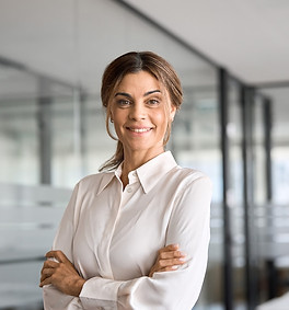 mature-business-woman-standing-in-office-looking-a-2026-03-18-16-01-15-utc.jpg