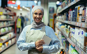 portrait-of-a-woman-in-a-hijab-a-shop-worker-in-a-2026-01-09-07-49-44-utc.jpg